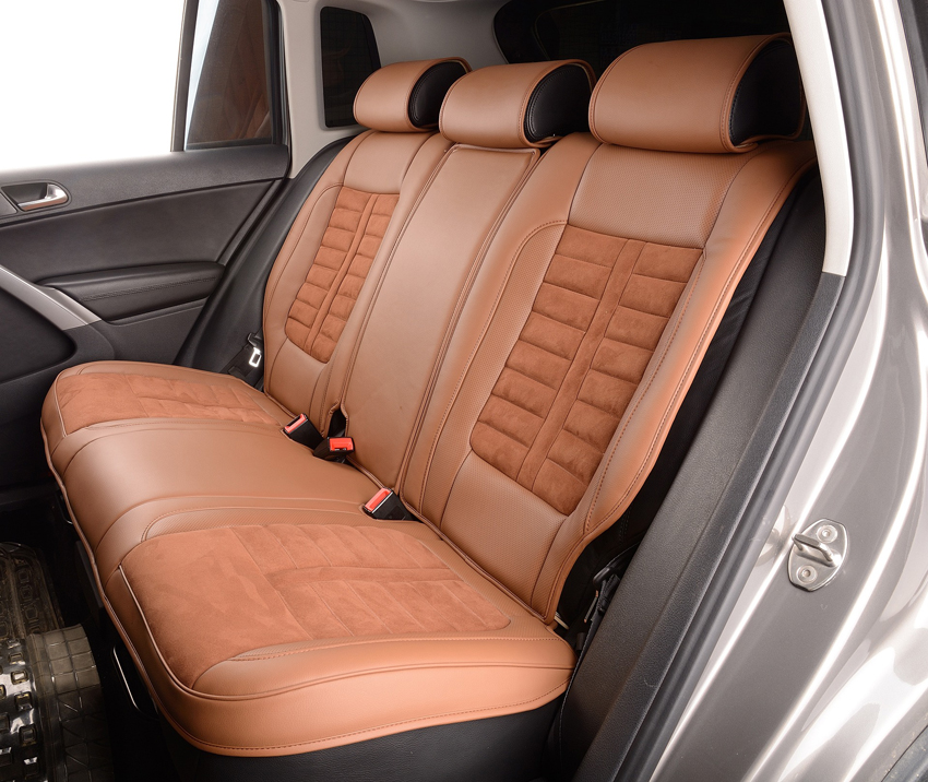 Back seat with leather upholstery in the vehicle interior with leather care