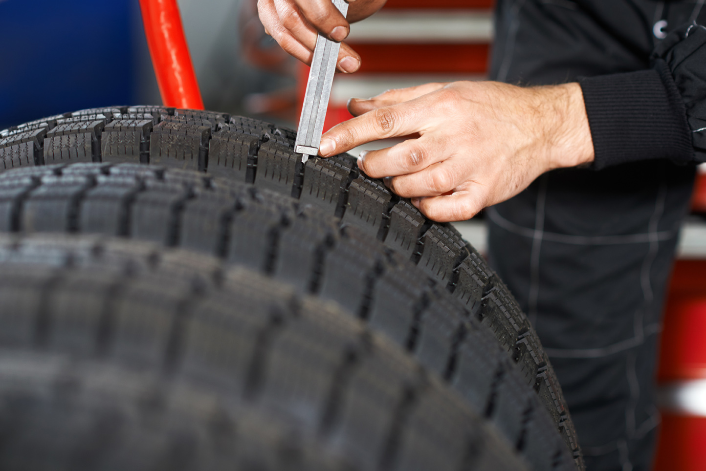 Tire is tested with a tread depth gauge